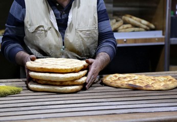 pide master makes pide with meat and vegetables .artvin/turkey
