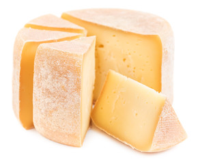 Pieces of natural hard cheese isolated