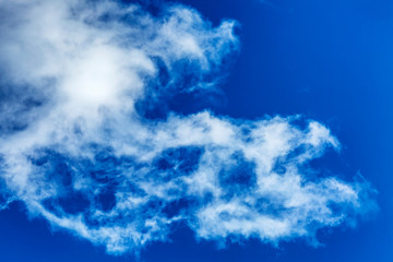Fototapeta na wymiar Bright blue sky with big cloud, background