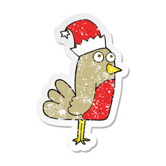 retro distressed sticker of a cartoon christmas robin