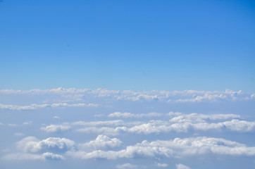 the sky with clouds view from airplane window