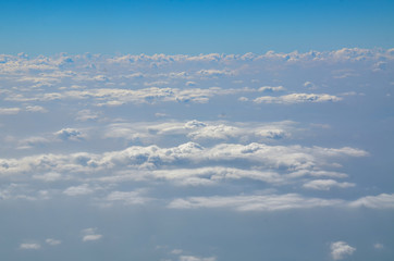 The sky with clouds view from airplane window