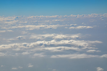 The sky with clouds view from airplane window
