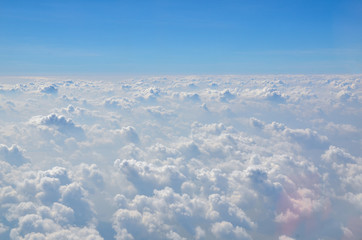 Naklejka premium The sky with clouds view from airplane window