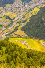 Alpe di Siusi, Seiser Alm with Sassolungo Langkofel Dolomite, a close up of a lush green hillside