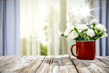 Desk of free space and blurred background of window and spring time.