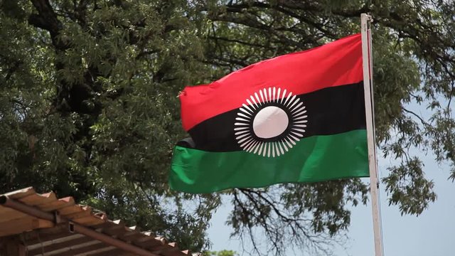 Malawi flag blowing in wind