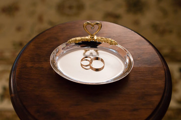 Gold rings on the stand for rings