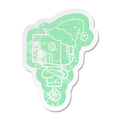 cartoon distressed sticker of a robot wearing santa hat