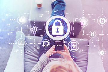 Cyber security with man using a smartphone in a modern gray chair