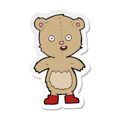 sticker of a cartoon happy teddy bear in boots