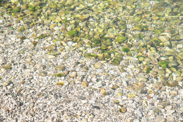 water with pebbles rocks. texture