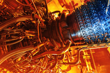 Gas turbine engine located inside the aircraft. Clean energy in a power plant used on an offshore oil and gas refining central platform. Oil gas, ecology and clean energy concept