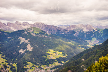 Alpe di Siusi, Seiser Alm with Sassolungo Langkofel Dolomite, a view of a large mountain in the background