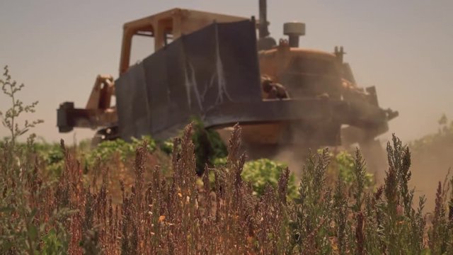120 fps slow motion shot of field plower
