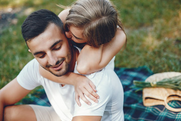 Obraz premium Beautiful couple spend time in a summer park