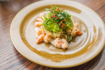 spring salad with herbs and boiled shrimps