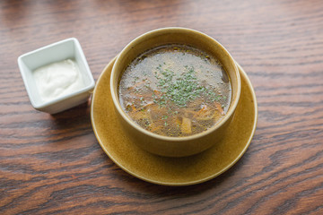 rich mushroom soup with vegetables and herbs