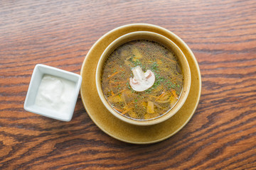 rich mushroom soup with vegetables and herbs