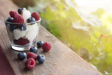 berries raspberries and blueberries with ice cream