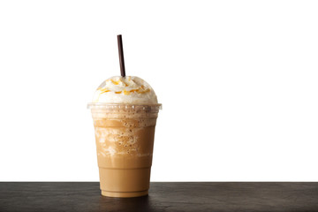 Cappuccino blended in plastic cup. Served with whipped cream. Refreshment drink. Favorite caffeine...