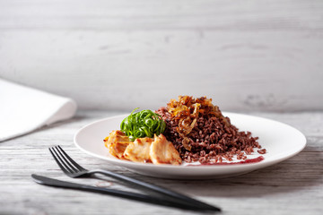 red rice with chicken and caramelized onions cranberry sauce