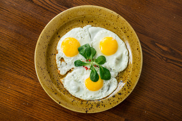 fried eggs-three eggs with herbs