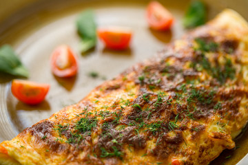 baked pie with cheese and cherry tomatoes