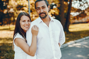Fototapeta premium Wife with her husband in a summer park
