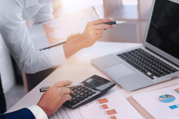 Business executives make a conversation with documents in office.