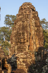 Fototapeta na wymiar Face towers of Bayon temple in Angkor Thom