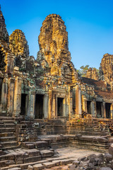 Naklejka premium Bayon temple in Angkor Thom, Cambodia: first enclosure wall, galleries and face towers.