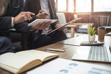 business executives consulting negotiation meeting on performance sales in office.