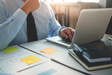 business executive consulting doing job with valuation investment in office.