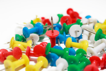 Fototapeta premium Colorful pushpins on white background