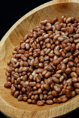 Carioca Beans into a bowl. Agriculture, seed.
