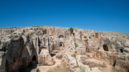 Fototapeta na wymiar Perre is an ancient city with approximately 200 cave tombs and a settlement place in Adiyaman, Turkey