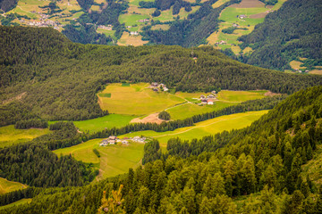 Alpe di Siusi, Seiser Alm with Sassolungo Langkofel Dolomite, a large green field with a mountain...