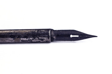 Vintage ink pen. Antique drawing tool on white background.