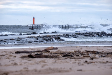 moderate storm in baltic sea near lighthouse