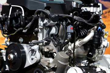 Fototapeta na wymiar Car engine part, concept of modern vehicle motor and cut metal car engine part details