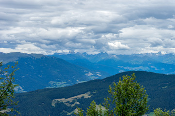 Alpe di Siusi, Seiser Alm with Sassolungo Langkofel Dolomite, a view of a large mountain in the background
