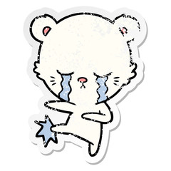 distressed sticker of a crying cartoon polar bear kicking out
