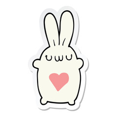 sticker of a cute cartoon rabbit with love heart