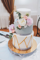 Beautiful luxury wedding cake decorated with flowers