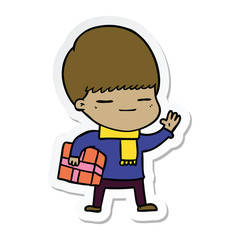 sticker of a cartoon smug boy carrying present