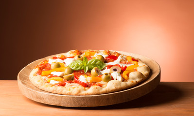 Vegetarian pizza on the wooden table