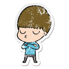 Obraz premium distressed sticker of a cartoon calm boy