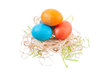 Easter: Group Of Colored Eggs In A Small Nest