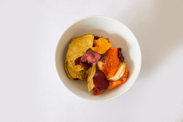 vegetable chips carrot sweet potato beetroot potato pumpkin butternut healthy snack white background